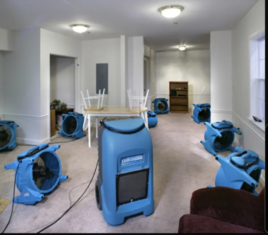 Air movers and dehumidifier setup for Water Damage Restoration in Live Oak